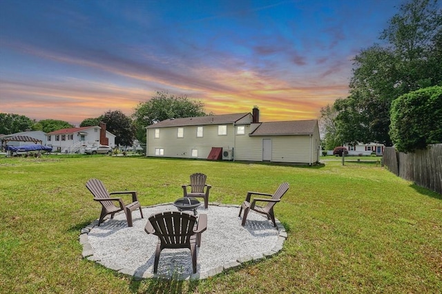 216 Pineview Cir, Agawam, MA 01001 - yard at dusk featuring a fire pit and a patio