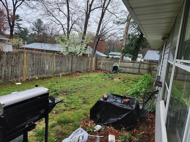 view of yard featuring a fenced backyard