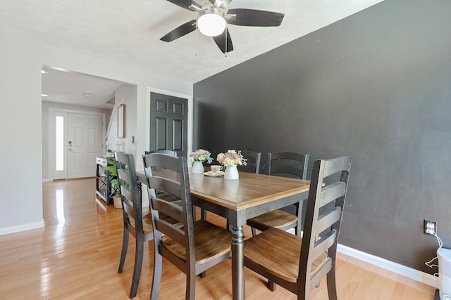 34 Lowell Rd Unit 21, Pepperell, MA 01463 - dining area featuring light wood-style flooring and ceiling fan