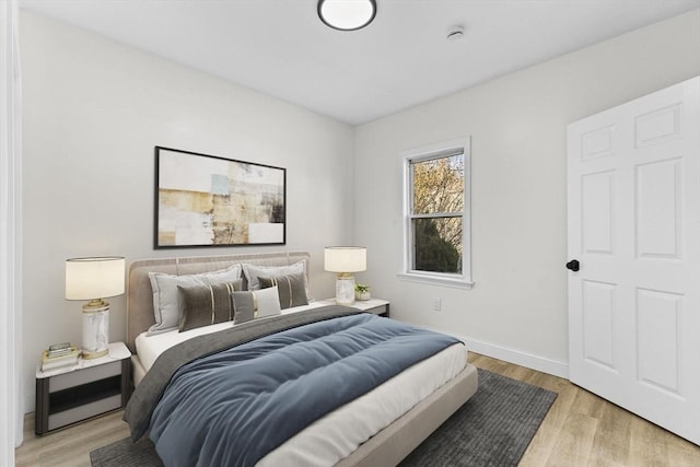 bedroom with light hardwood / wood-style flooring