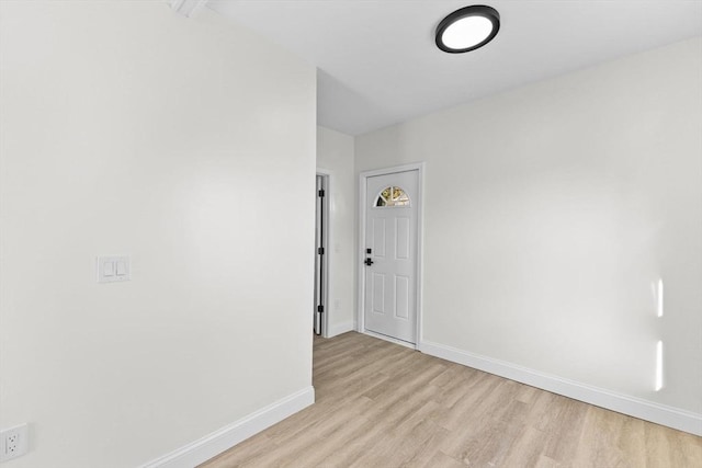 unfurnished room featuring light hardwood / wood-style floors