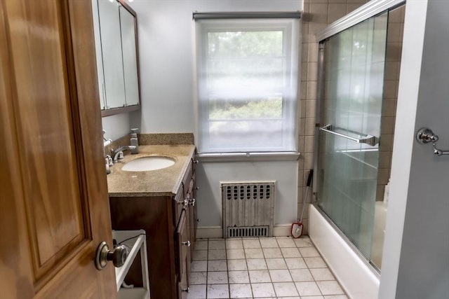 118 Dudley Ln, Milton, MA 02186 - full bath featuring radiator, vanity, and shower / bath combination with glass door
