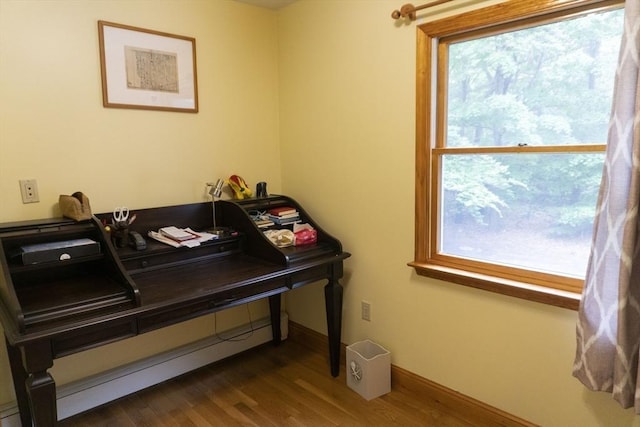 118 Dudley Ln, Milton, MA 02186 - sitting room with wood finished floors, plenty of natural light, an office area, and baseboards