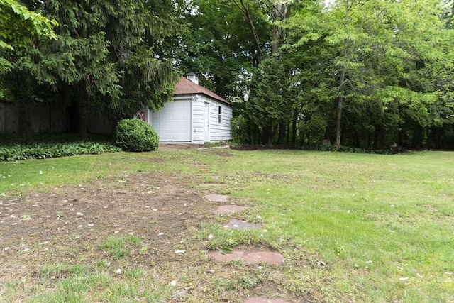 118 Dudley Ln, Milton, MA 02186 - view of green lawn with an outbuilding and a detached garage