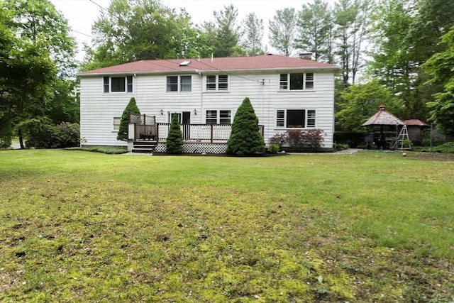 118 Dudley Ln, Milton, MA 02186 - back of house featuring a chimney, a wooden deck, a yard, and a gazebo