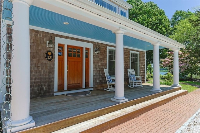 25 Richard Ln, Eastham, MA 02642 - doorway to property featuring covered porch