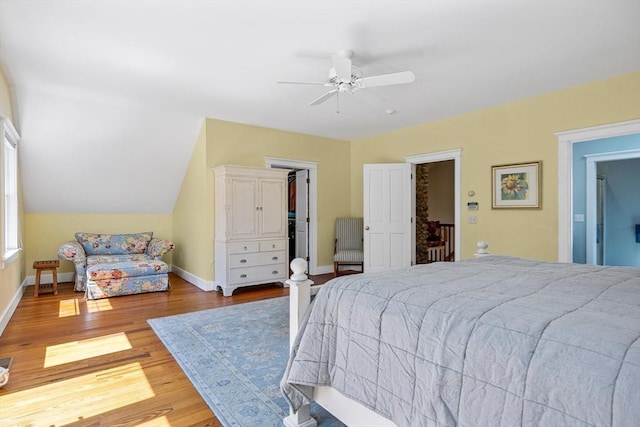 25 Richard Ln, Eastham, MA 02642 - bedroom featuring wood finished floors, a walk in closet, and ceiling fan