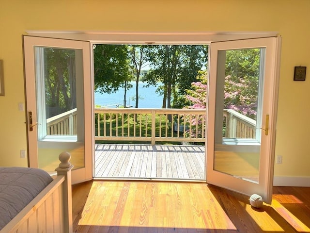 25 Richard Ln, Eastham, MA 02642 - doorway featuring wood finished floors and a water view