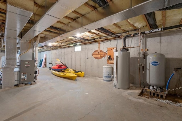 25 Richard Ln, Eastham, MA 02642 - basement featuring water heater and a water pressure tank