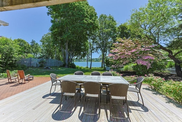 25 Richard Ln, Eastham, MA 02642 - wooden deck featuring a water view and outdoor dining area