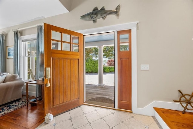 25 Richard Ln, Eastham, MA 02642 - foyer featuring ornate columns and baseboards