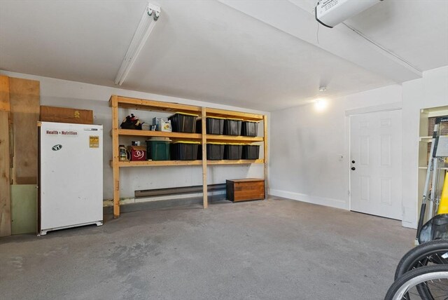 garage with freestanding refrigerator