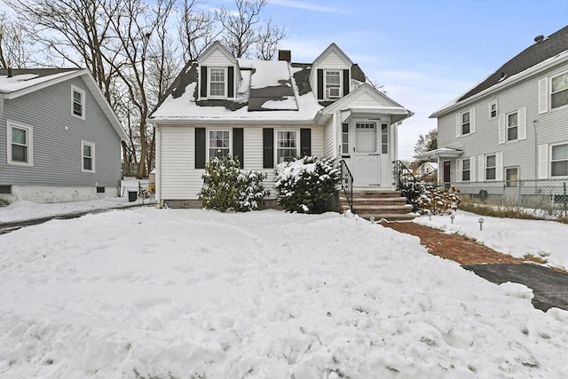 view of new england style home