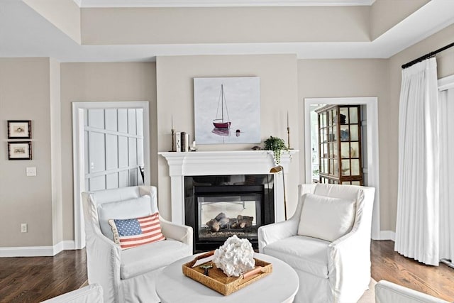 90 Chittenden Ln Unit 90, Cohasset, MA 02025 - living area featuring wood finished floors and a multi sided fireplace
