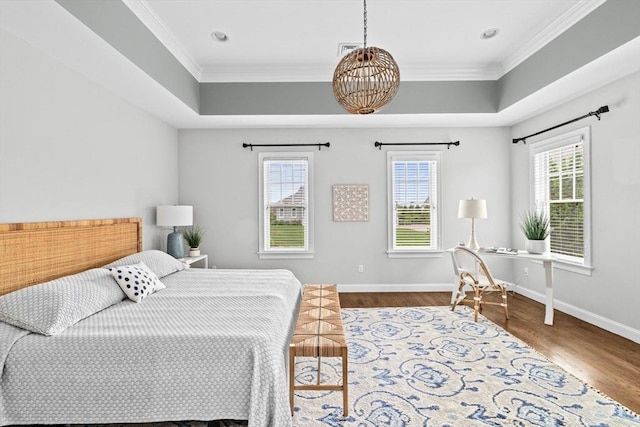90 Chittenden Ln Unit 90, Cohasset, MA 02025 - bedroom with wood finished floors, crown molding, a tray ceiling, and recessed lighting