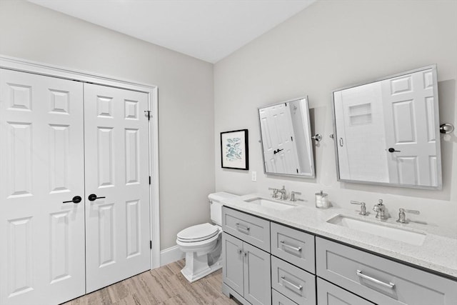 90 Chittenden Ln Unit 90, Cohasset, MA 02025 - bathroom with double vanity and wood finished floors