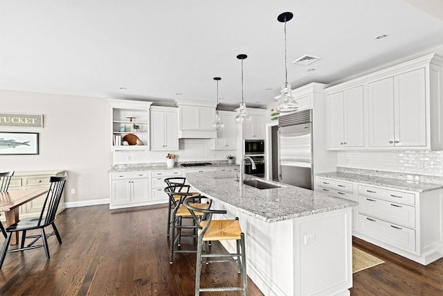 90 Chittenden Ln Unit 90, Cohasset, MA 02025 - kitchen with built in appliances, tasteful backsplash, open shelves, white cabinetry, and recessed lighting