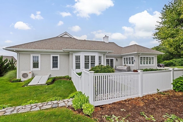 90 Chittenden Ln Unit 90, Cohasset, MA 02025 - back of property featuring a chimney, a shingled roof, and an outdoor hangout area