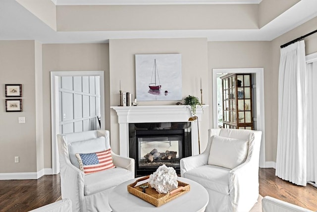 90 Chittenden Ln Unit 90, Cohasset, MA 02025 - living area featuring wood finished floors and a multi sided fireplace