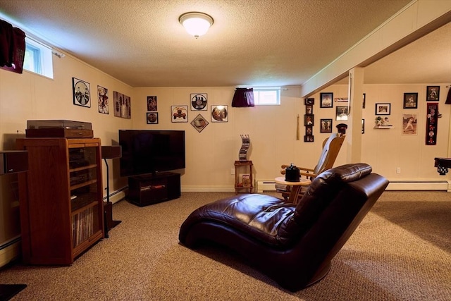 carpeted living area with a textured ceiling and a baseboard heating unit