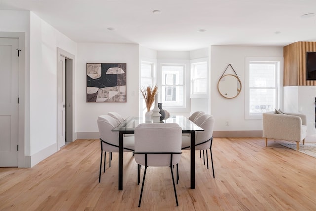 dining room featuring light hardwood / wood-style floors