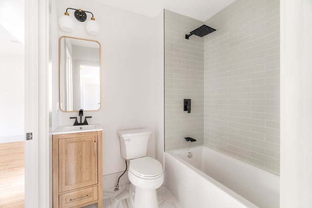 full bathroom with toilet, vanity, tiled shower / bath combo, and hardwood / wood-style flooring