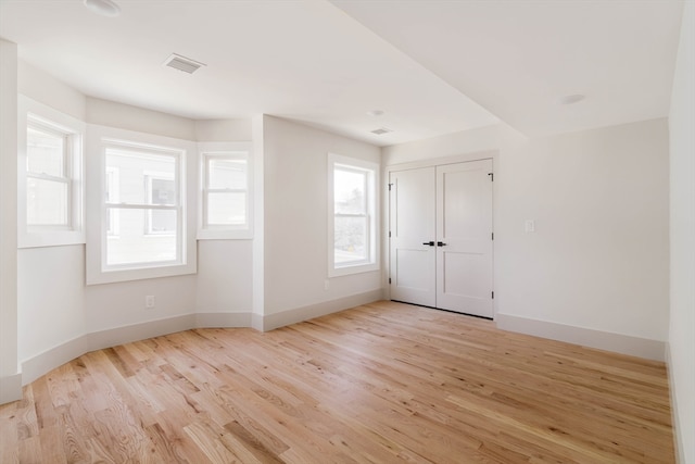 empty room featuring light wood-type flooring