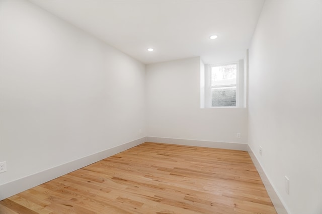 empty room with light wood-type flooring