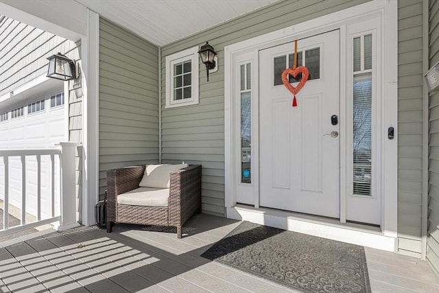 doorway to property featuring a porch