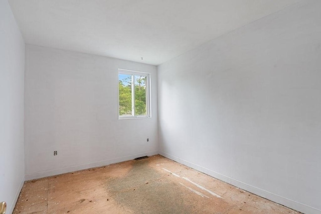 1 Charles St Unit W, Reading, MA 01867 - empty room featuring baseboards