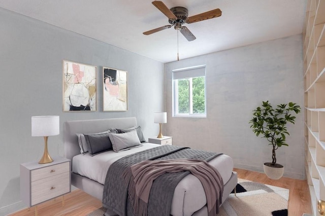 1 Charles St Unit W, Reading, MA 01867 - bedroom with light wood finished floors and ceiling fan