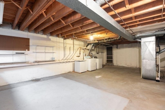 1 Charles St Unit W, Reading, MA 01867 - unfinished below grade area with washing machine and clothes dryer and heating unit