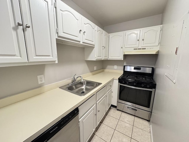 kitchen featuring stainless steel appliances, white cabinets, light countertops, and under cabinet range hood