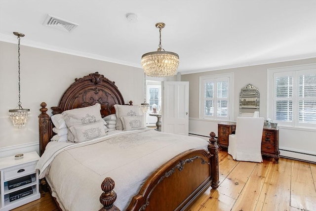 bedroom with crown molding, hardwood / wood-style floors, multiple windows, and a notable chandelier