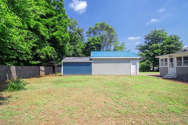 garage with a yard