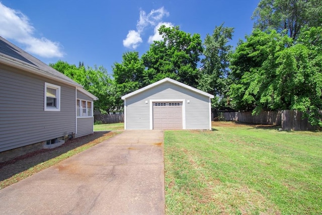 garage featuring a yard