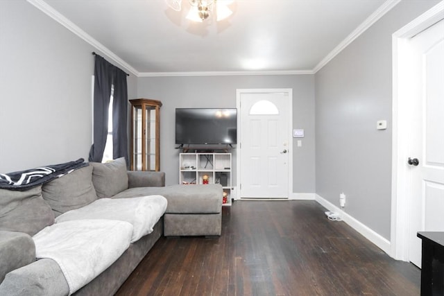 living room with dark hardwood / wood-style flooring and ornamental molding