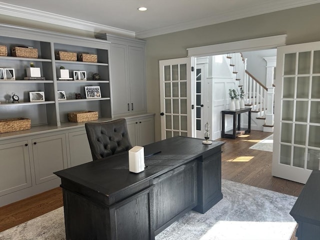 home office featuring french doors, wood finished floors, ornamental molding, and recessed lighting