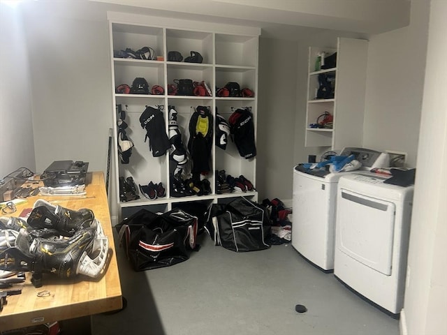 laundry room featuring separate washer and dryer and laundry area