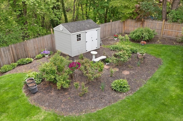 view of yard featuring an outbuilding and a storage shed