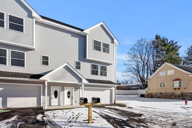 view of front of property featuring a garage