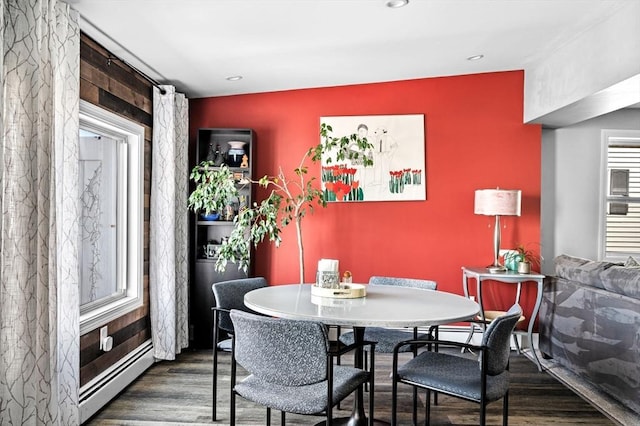 67 N End Blvd Unit 1, Salisbury, MA 01952 - dining room featuring dark wood-type flooring, a baseboard radiator, and recessed lighting