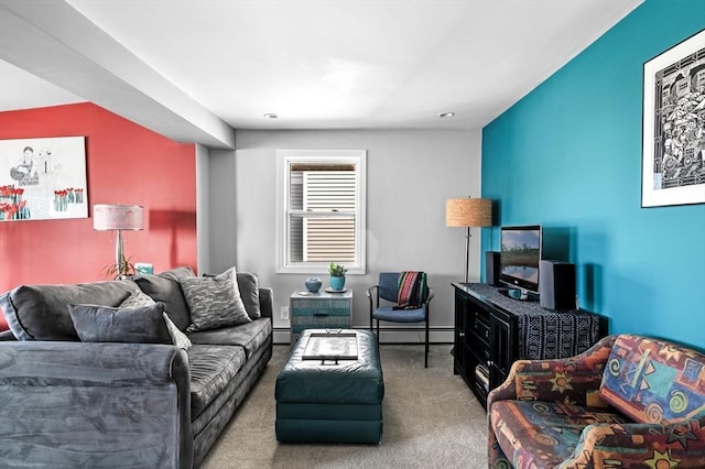 67 N End Blvd Unit 1, Salisbury, MA 01952 - carpeted living room featuring a baseboard heating unit