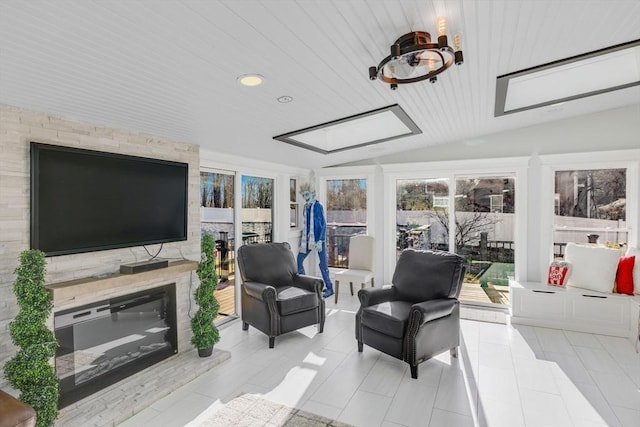 sunroom / solarium with lofted ceiling and wood ceiling