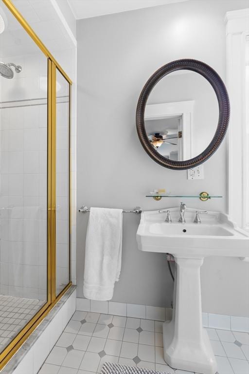 32 Oneida Rd, Winchester, MA 01890 - bathroom with a stall shower, ceiling fan, and tile patterned floors