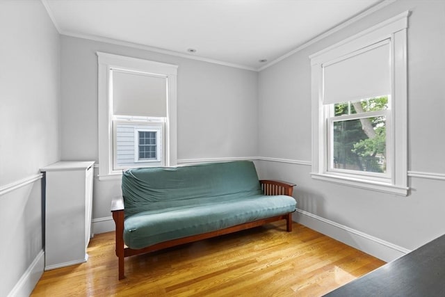 32 Oneida Rd, Winchester, MA 01890 - living area featuring light wood finished floors and crown molding