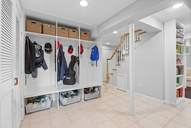 32 Oneida Rd, Winchester, MA 01890 - mudroom with recessed lighting and tile patterned flooring