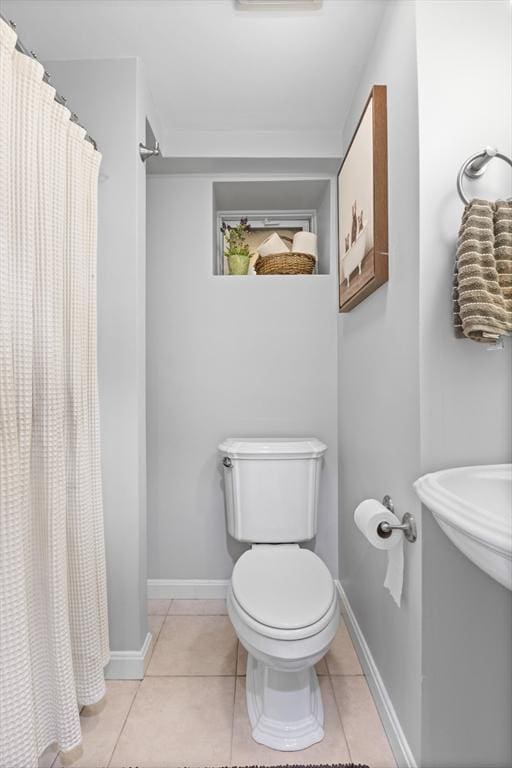 32 Oneida Rd, Winchester, MA 01890 - full bath featuring tile patterned floors and a shower with shower curtain