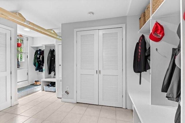 32 Oneida Rd, Winchester, MA 01890 - mudroom with light tile patterned floors