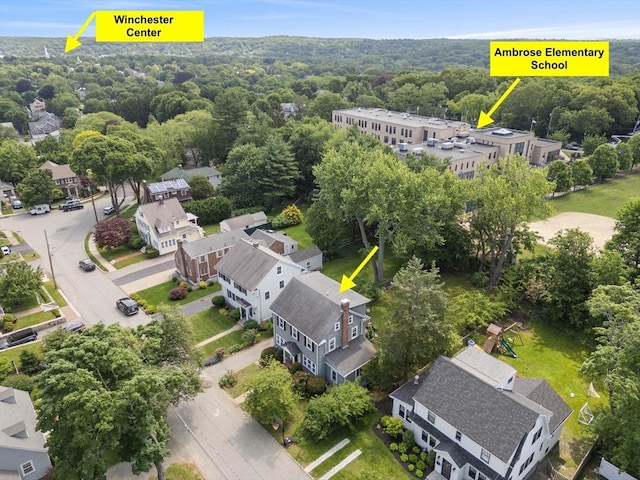 32 Oneida Rd, Winchester, MA 01890 - aerial perspective of suburban area featuring a forest